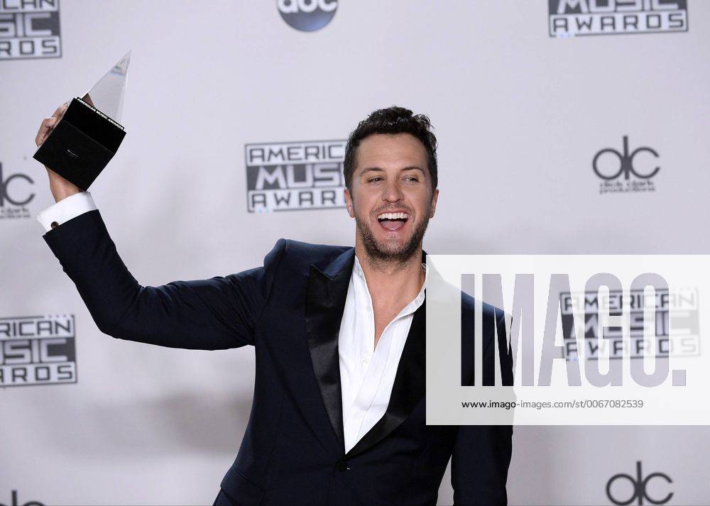Recording artist Luke Bryan, winner of Favorite Country Male Artist, appears backstage during the 43rd annual American Music Awards held at Microsoft Theater in Los Angeles on November 22, 2015. LAP20151122416 JIMxRUYMEN