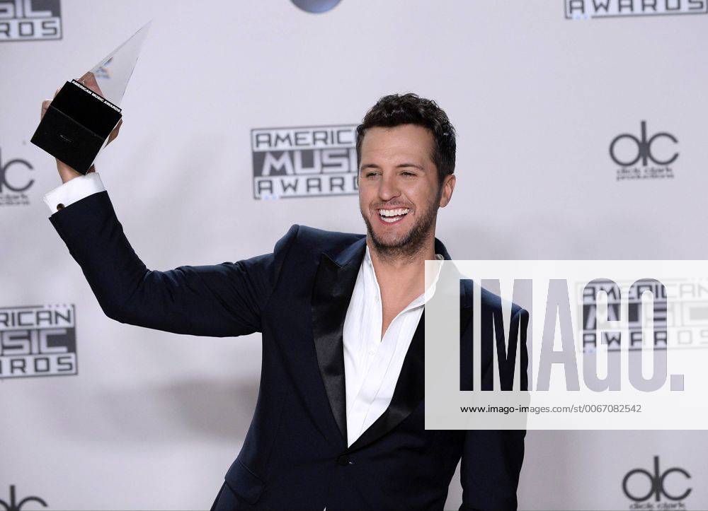 Recording artist Luke Bryan, winner of Favorite Country Male Artist, appears backstage during the 43rd annual American Music Awards held at Microsoft Theater in Los Angeles on November 22, 2015. LAP20151122417 JIMxRUYMEN