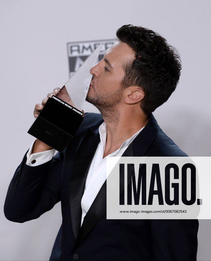 Recording artist Luke Bryan, winner of Favorite Country Male Artist, appears backstage during the 43rd annual American Music Awards held at Microsoft Theater in Los Angeles on November 22, 2015. LAP20151122418 JIMxRUYMEN