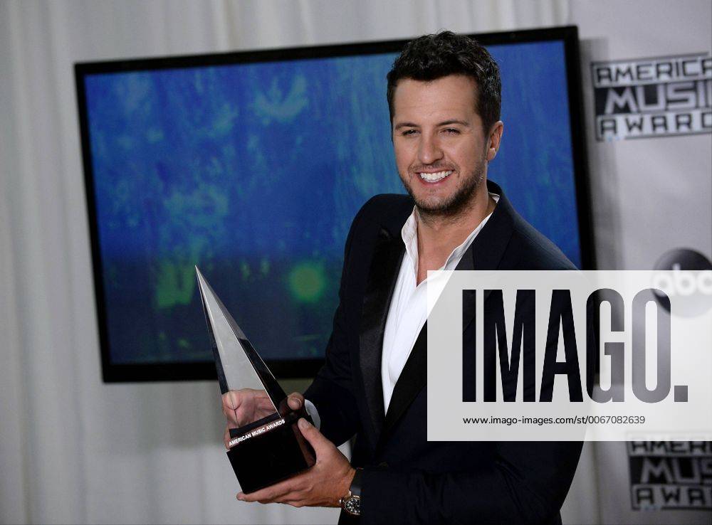 Recording artist Luke Bryan, winner of Favorite Country Male Artist, appears backstage during the 43rd annual American Music Awards held at Microsoft Theater in Los Angeles on November 22, 2015. LAP20151122420 JIMxRUYMEN