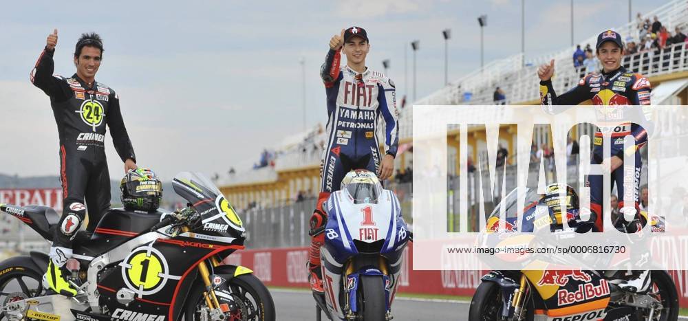 GP von Valencia - (L-R) Moto2 Weltmeister Tony Elias (ESP Moriwaki) - MotoGP Weltmeister Jorge Lorenzo (ESP Yamaha Racing) - 125er Weltmeister Marc Marquez (ESP redBull derby team)