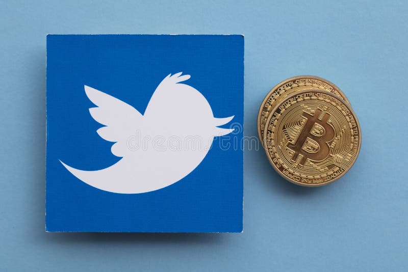 LONDON, UK - March 2021: Bitcoin cryptocurrency on a Twitter social media logo, LONDON, UK - March 2021: Bitcoin cryptocurrency on a Twitter social media logo.