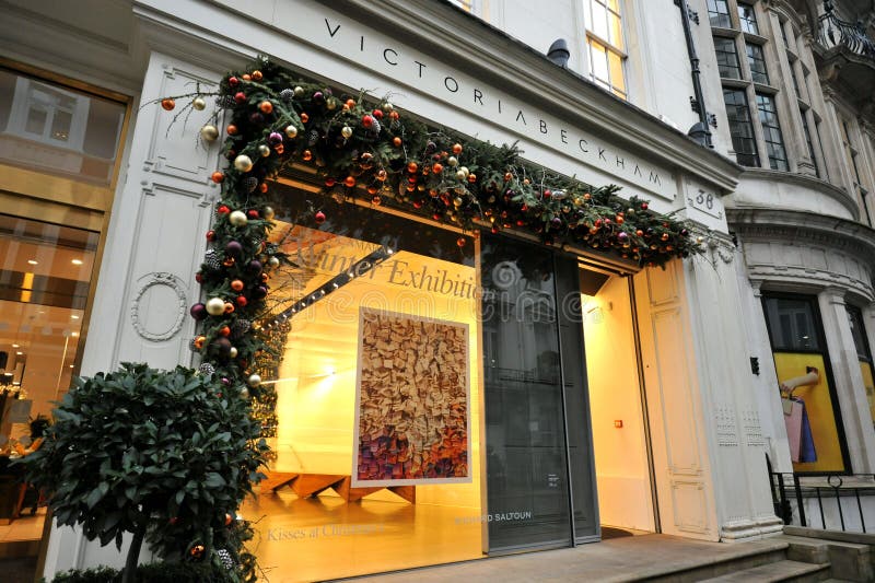 Victoria Beckham fashion store in London, England, The Victoria Beckham label was named designer brand of the year in the UK in 2011; in 2012 the brand was assessed as the star performer in the Beckham family`s business interests. Mrs Beckham controls the business with her husband and former Manchester United star David Beckham, via their company Beckham Brands Holdings