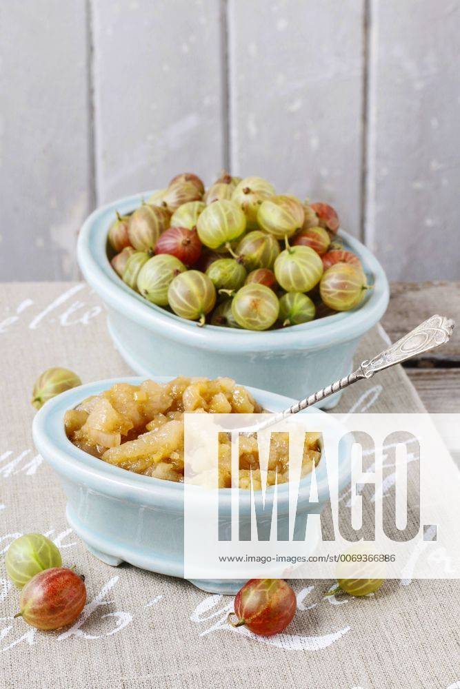 Bowls of gooseberries and jam. Healthy fruits bew1B02F4E