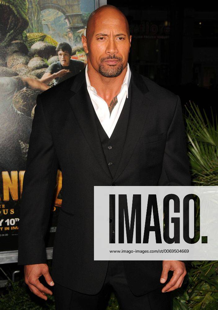 Feb. 2, 2012 - Los Angeles, California, U.S. - Dwayne Johnson Attending The Los Angeles Premiere of Journey 2 The Mysterious Island held At the Grauman s Chinese Theatre in Hollywood, California on 2 2 12. 2012. - ZUMAl89_
