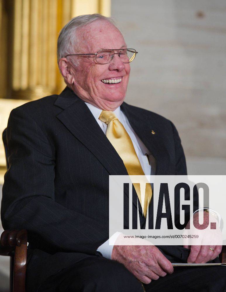 Washington, DC, United States of America - Apollo 11 astronaut Neil Armstrong, the first man to walk on the Moon, laughs at a remark made during a Congressional Gold Medal ceremony honoring astronauts Michael Collins, Buzz Aldrin, John Glenn and Armstrong in the Rotunda at the US Capitol November 16, 2011 in Washington, DC. Washington United States of America - ZUMAp138
