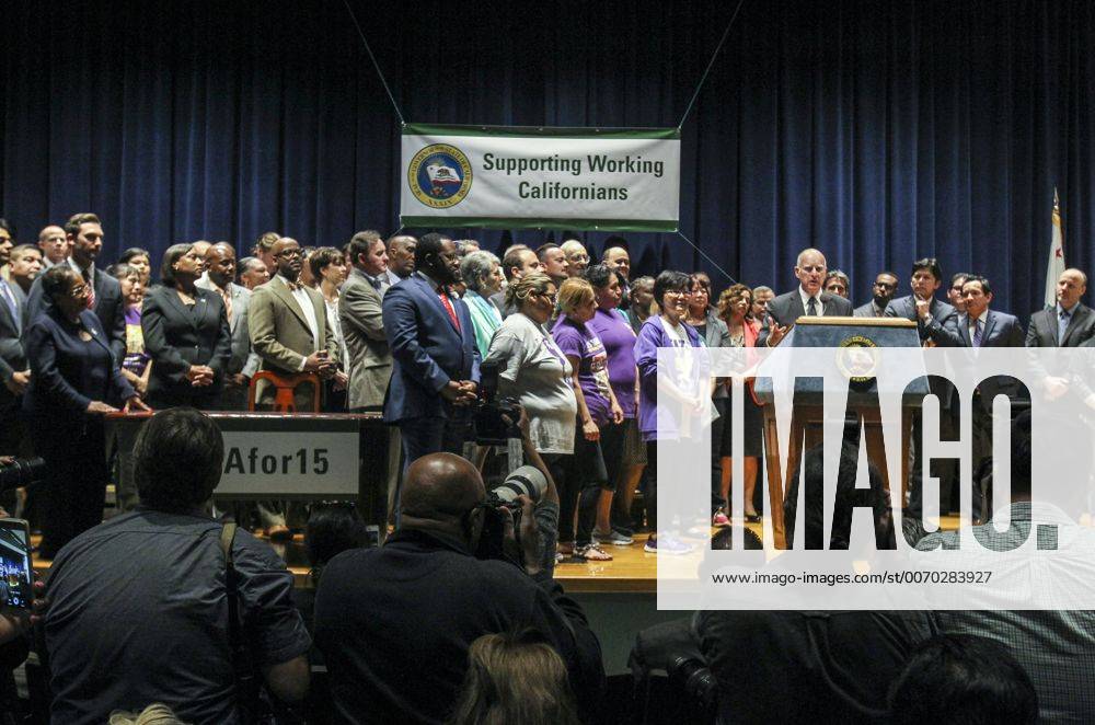 Los Angeles, California, U.S - Governor Jerry Brown joins supporters from across the state in Los Angeles on Monday April 4, 2016, to sign landmark legislation passed by both houses of the Legislature last week Ã SB 3. The SB 3 makes California the first state in the nation to commit to raising the minimum wage to $15 per hour statewide. Under the plan, minimum wage will rise to $10.50 per hour on January 1, 2017 for businesses with 26 or more employees, and then rises each year until reaching $15 per hour in 2022. This plan also recognizes the contributions of small businesses Ã those with 25 or fewer employees Ã to California s economy and allows additional time for these employers to phase in the increases. Los Angeles U.S. - ZUMAc68_