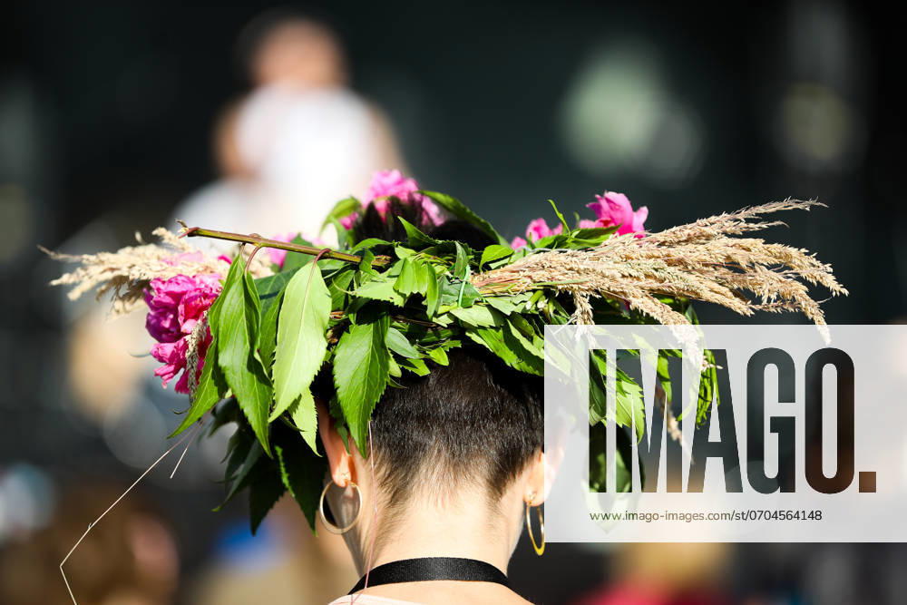 Wreaths Festival In Krakow Astrid is performing on stage at Wawel Castle during the Wreath Festival in Krakow, Poland, on June 22, 2024. The Wreath Festival, or Music Festival in Krakow, is an annual event organized during the summer solstice called Kupala Night. This holiday refers to the traditions of the Slavs and their rituals, where herbs and flowers play an important role. During the event, participants are weaving wreaths, throwing them down the Vistula River, or attending concerts near Wawel. Krakow Poland