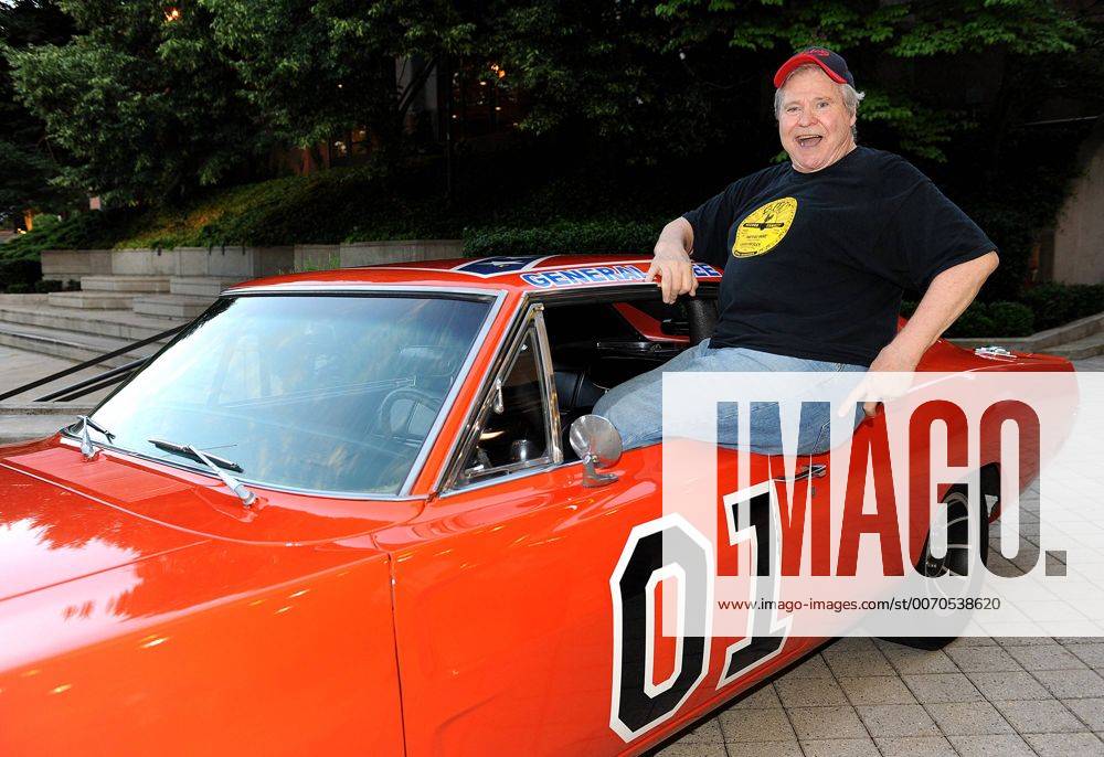 Durham, North Carolina; USA - Singer Actor Politician BEN JONES who played COOTER DAVENPORT in the hit television show The Dukes of Hazzard poses with the famed car from the television series The General Lee while at The Carolina Theater located in Durham. Copyright 2011 Jason Moore. - ZUMAm78_