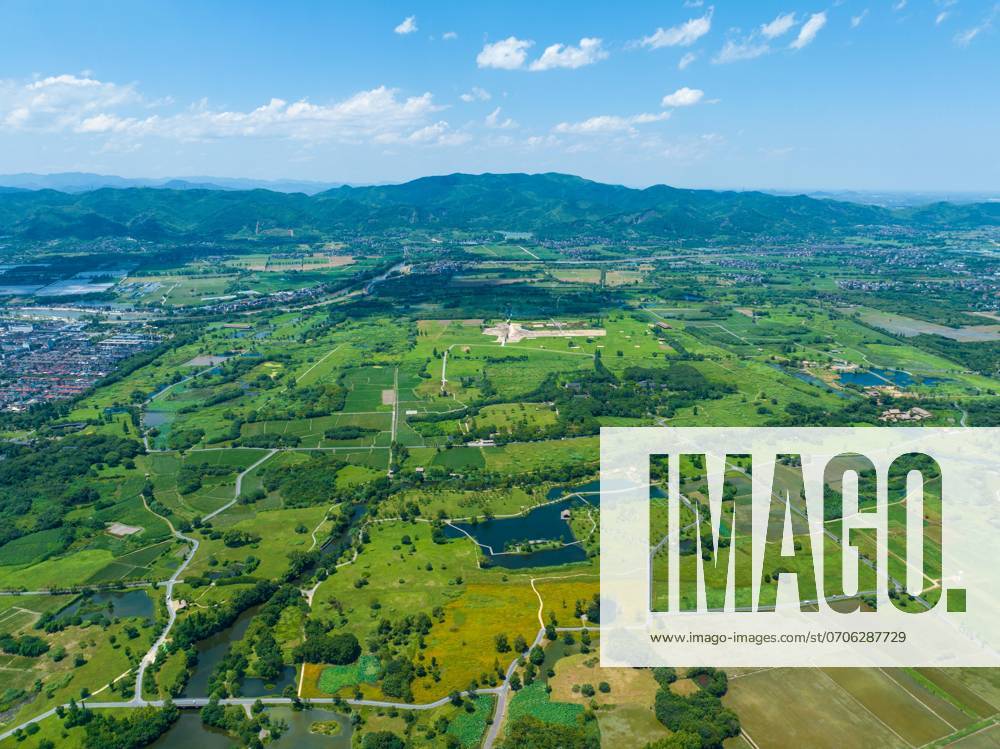 (240705) -- HANGZHOU, July 5, 2024 -- An aerial drone photo taken on July 4, 2024 shows the Archaeological Ruins of Liangzhu City park in Hangzhou, capital city of east China s Zhejiang Province. The Archaeological Ruins of Liangzhu City, located in east China s Zhejiang Province, have gained worldwide recognition as bearing testimony to the existence of at least 5,000 years of Chinese civilization. This year marks the 5th anniversary of its inscription on the World Heritage List as a cultural site. ) (ZhejiangPictorial) CHINA-ZHEJIANG-HANGZHOU-LIANGZHU-RUINS PARK (CN) JiangxHan