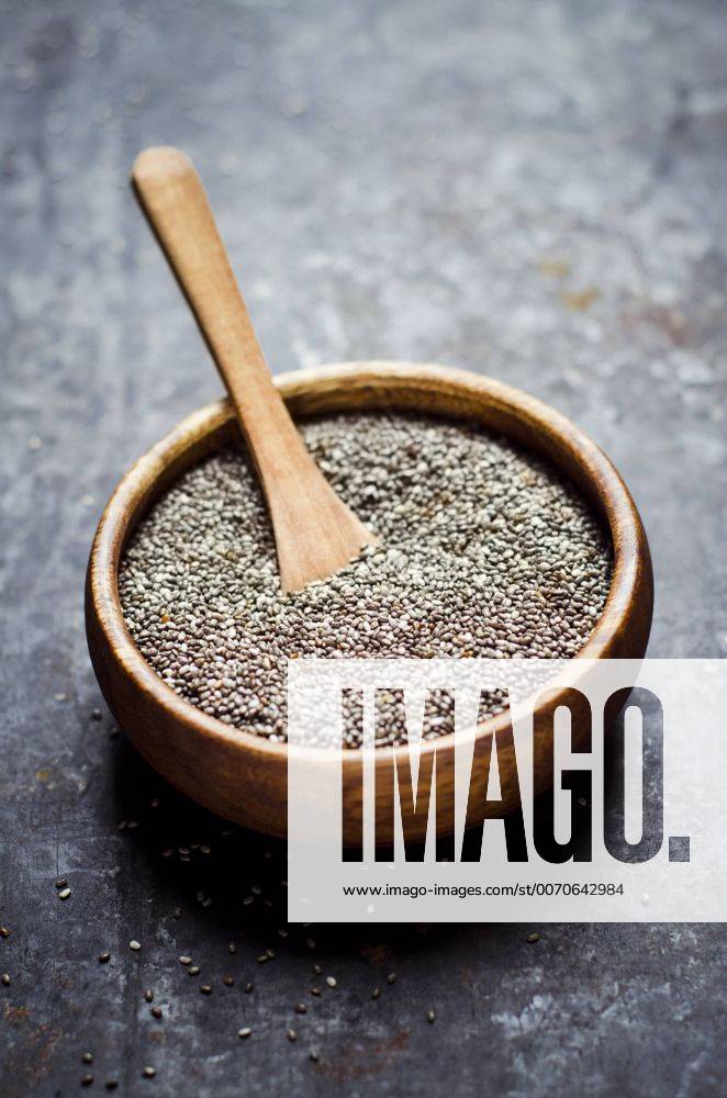 Wooden bowl of black chia seeds CZF000245