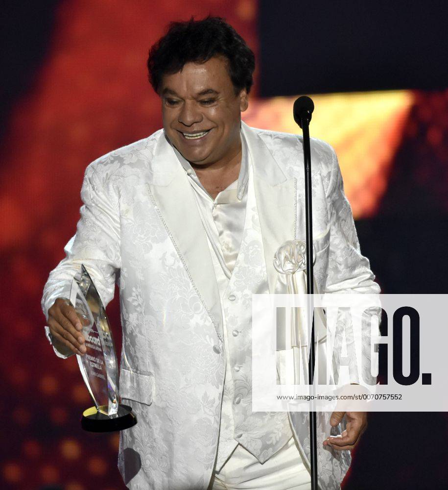 Latin artist Juan Gabrial holds and award at the 2016 Billboard Latin Music Awards at the Bank United Center, University of Miami, Miami, Florida on April 28, 2016. MIA20160428153 GARYxIxROTHSTEIN