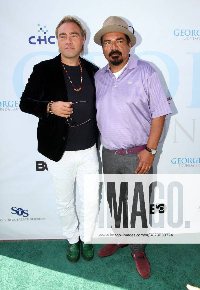 George Lopez and Guest THE NINTH ANNUAL GEORGE LOPEZ CELEBRITY GOLF CLASSIC BENEFITING THE GEORGE LOPEZ FOUNDATION Los Angeles Michael Heart PicturePerfect