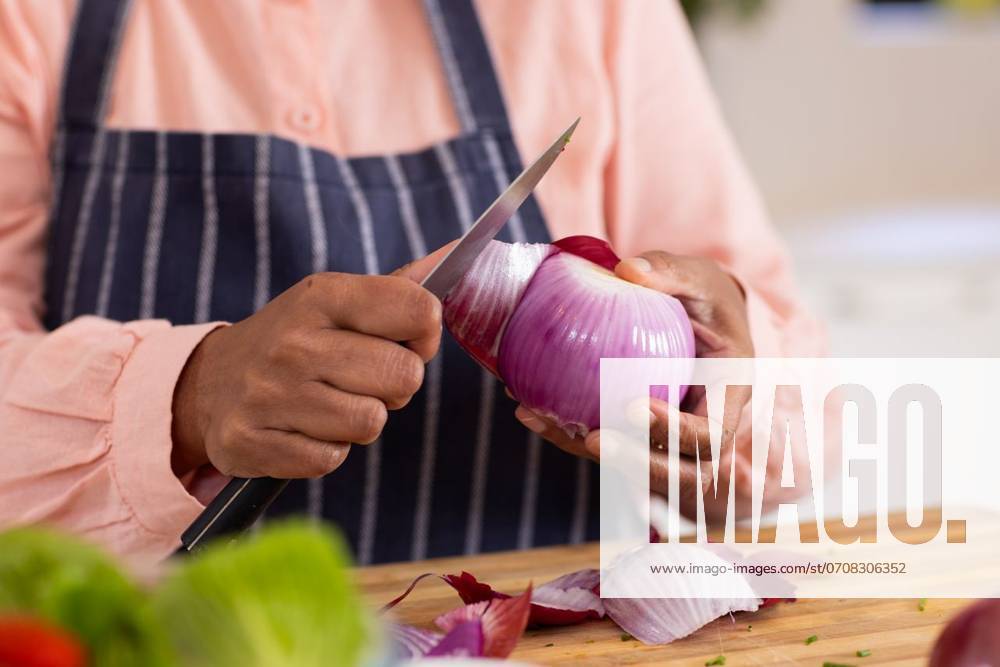 IMAGO Creative, Food, Pickled Onions Chopping red onion, person preparing ingredients for cooking in kitchen Chopping red onion, person preparing ingredients for cooking in kitchen. preparation, slicing, culinary, fresh, vegetables, food, model released, , property released, Cape Town, South Africa, 18.04.2024, 5480175.jpg, people,chopping,red,onion,person,preparing,ingredients,cooking,kitchen,preparation,slicing,culinary,fresh,vegetables,food,knife,cutting,board,hands,chef,home,unaltered,meal,healthy,diet,organic,raw,recipe,gourmet,cuisine,domestic,lifestyle,ingredient,nutrition,vegetarian,vegan,chopping board,culinary arts,cook,kitchenware,preparation process,hand,culinary skills,kitchen counter,food preparation,culinary preparation,fresh ingredients,vegetable preparation,c