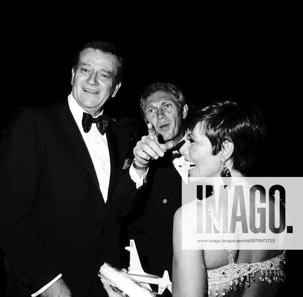 Jan. 1, 2011 - Hollywood, California, U.S. - JOHN WAYNE WITH STEVE MCQUEEN AND HIS WIFE NEILE ADAMS AT THE GOLDEN S, COCONUT GROVE.1967. 4629. - ZUMAr82_