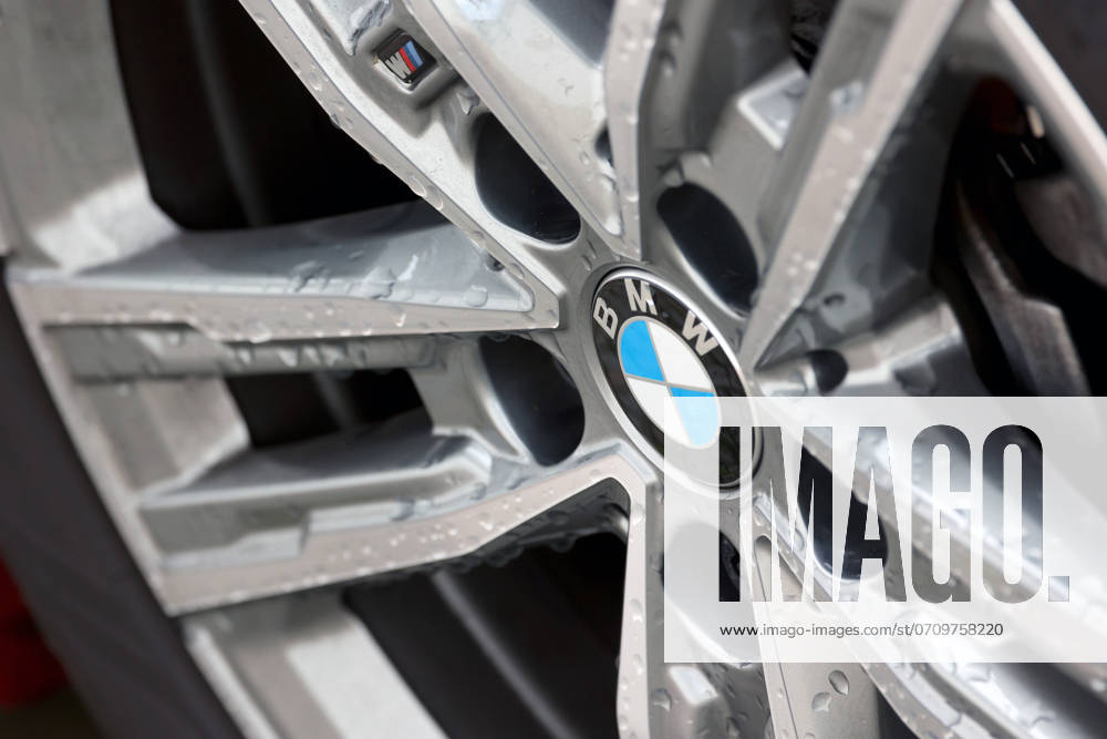 BMW logo on a BMW vehicle, rim There are drops of water on the logo and the rim BMW on 12 07 2024 in Siegen Germany