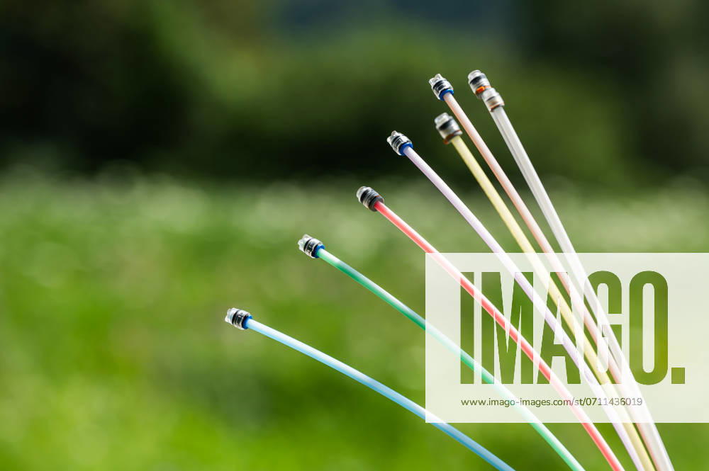 Fiber optic cable with various connections protruding from the ground near a residential area near Rottweil at a construction site Rottweil Baden Württemberg Germany
