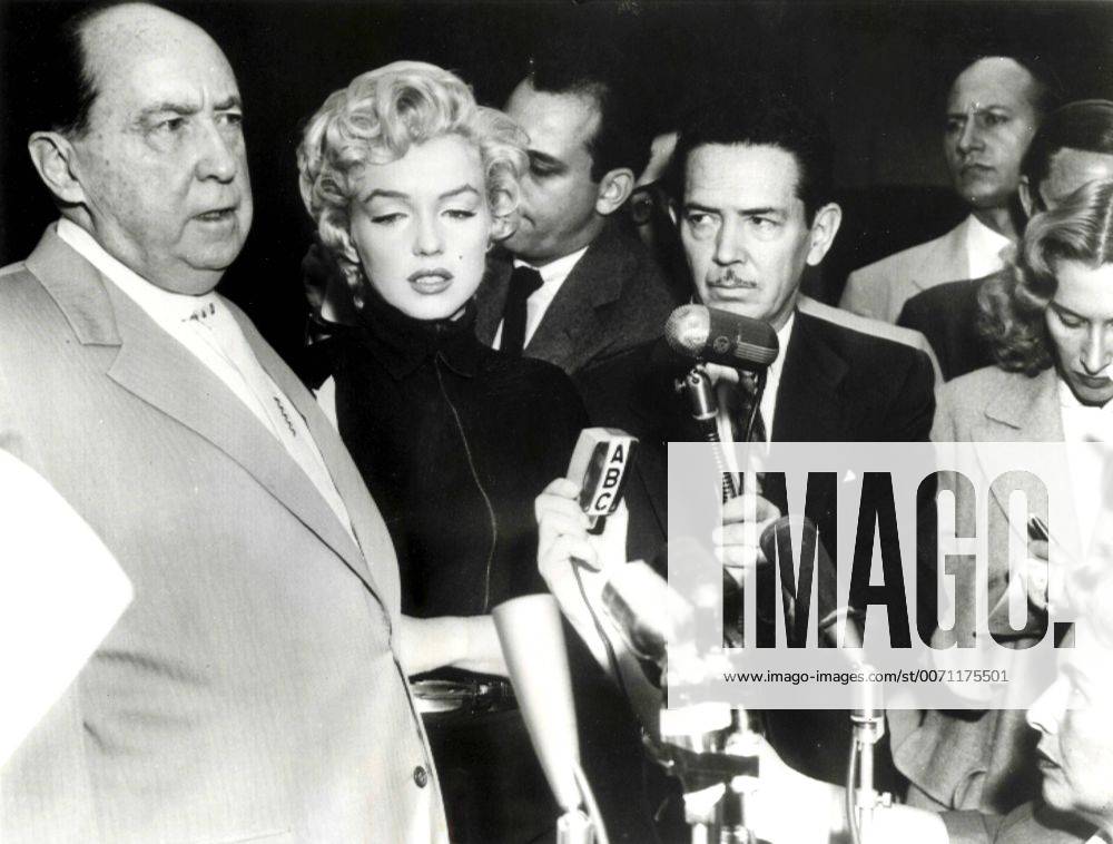 IMAGO ICONS: Marilyn Monroe American actress Marilyn Monroe with his lawyer Jerry Geisler makes statements to reporters following his separation from her husband Joe DiMaggio, New York, USA 02735