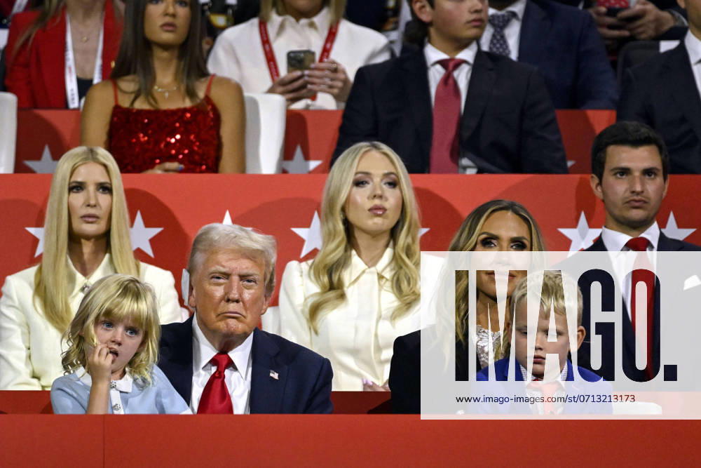 (L-R) Ivanka Trump, Carolina Dorothy Trump, former President Donald Trump, Tiffany Trump, Lara Trump, Eric Luke Trump, and Donald John III look on during the 2024 Republican National Convention at Fiserv Forum in Milwaukee, Wisconsin on Thursday, July 18, 2024. The theme of the final day is Make America Great Once Again, with former President Donald Trump as the featured speaker. MIL20240718333 MATTxMARTON