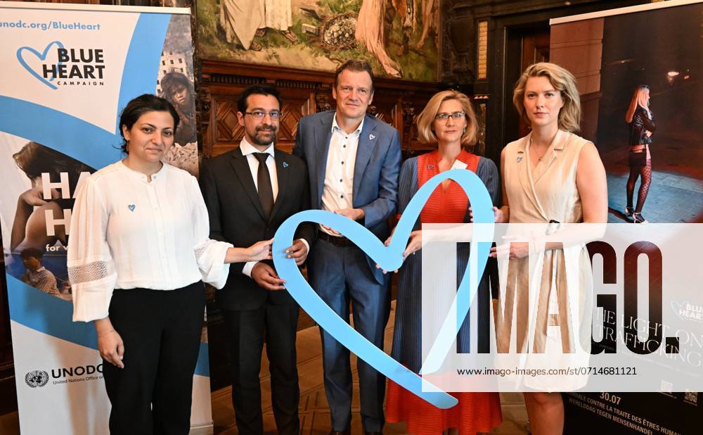 Launch Of The Blue Heart Campaign Antwerpen, Belgium - July 22 : Outgoing Justice Minister Paul Van Tigchelt (Open Vld), Julien Garsany( Representative UNODC ), Marise Habib ( IOM-OIM ), Inge Saris ( Payoke ) and Alderwoman Els Van Doesberg attend the launch of the United Nations Blue Heart campaign, ahead of the World Day Against Human Trafficking. As many as 1 in 3 victims of human trafficking worldwide are children. That is why this year s United Nations campaign focuses on the fight against child trafficking.on July 22, 2024 in Antwerpen, Belgium, 22 07 2024 Antwerpen Belgium