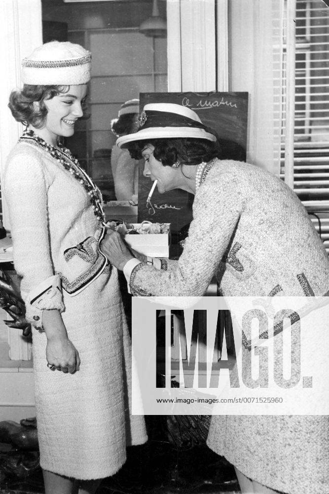 IMAGO ICONS: Coco Chanel Jan. 1, 2011 - COCO CHANEL FIXING ROMY SCHNEIDER.1971. PHOTOS - ZUMAg49_