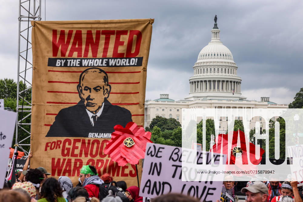 Demonstrators hold up signs during a protest on Pennsylvania Avenue prior to Israeli Prime Minister Benjamin Netanyahu s joint address to Congress at the US Capitol on July 24, 2024 in Washington DC.. NET20240724010 JemalxCountess