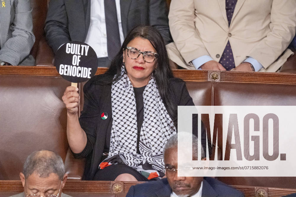 Rep. Rashida Tlaib, D-MI., holds a sign during a speech by Israeli Prime Minister Benjamin Netanyahu as he addresses a joint meeting of Congress on Capitol Hill in Washington, DC on Wednesday, July 24, 2024. Netanyahu is seeking bipartisan support for Israel just days after President Joe Biden announced he would end his re-election bid. WAS20240724539 KenxCedeno