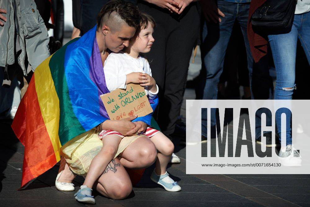 Toulouse, France - This woman hold a placard reading We stand with Orlando during a vigil held in Toulouse for the victims of the killings in the gay club Pulse in Orlanda, Florida by Omar Mateen. The killings was claimed by Daech (Islamic Stae). 49 people were killed.Toulouse. France. June 14th, 2016. Toulouse France - ZUMAn230