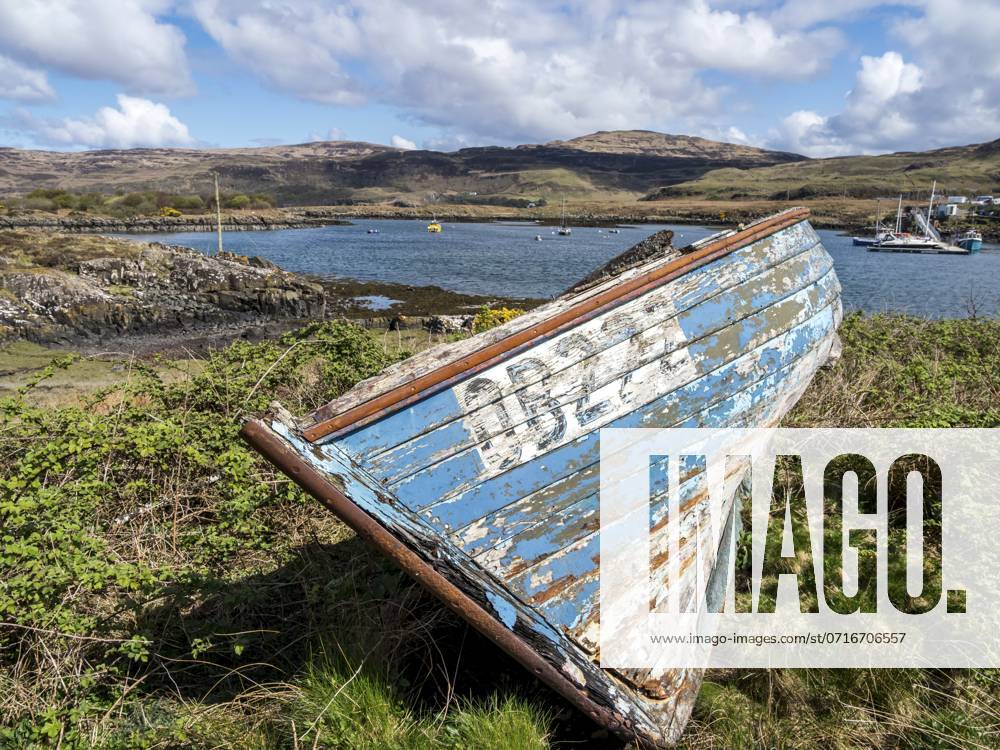 Ulva isle, boat on the shore, view to Isle of Mull, Ulva, Scotland, UK