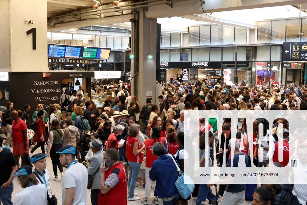 Paris Montparnasse station PHOTOPQR LE PARISIEN Olivier Lejeune PARIS 26 07 2024 SNCF train traffic was severely disrupted on Sunday after a power cable broke at the entrance to a tunnel JULY 26 2024 France Massive attack on fast train network French train operator SNCF has reported acts of intentional vandalism on several high speed rail routes The incidents, which have led to disruption, come immediately ahead of the opening of the 2024 Paris Olympics Local Caption LE PARISIEN PARIS France
