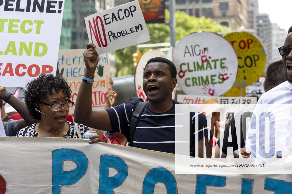 KW 30 July 26, 2024, New York, New York, USA: Ugandan climate activist HILLARY TAYLOR SEGUYA holds a sign that reads NO EACOP NO PROBLEM. East coast climate activists and Ugandan and Tanzanian climate leaders chant while holding banners and signs as they march through midtown Manhattan calling for insurance companies based in New York City to stop insuring EACOP (East African Crude Oil Pipeline,) the world s largest fossil fuel pipeline. The protest is part of the Summer Of Heat campaign against Wall Street s investment in fossil fuels. New York USA - ZUMAr174 20240726_znp_r174_005