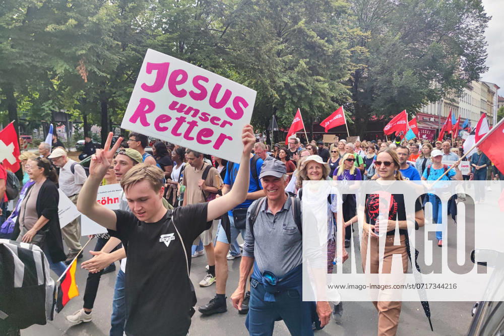 Kreuzberg Demonstration under the motto March for Freedom Strictly religious people march along Oranienstraße Flyers and banners advertise Mission Berlin, the associated website shows the operator as Miracle Center Church Berlin e V , responsible Jimmy Ntale, Lead Pastor MCC Berlin on