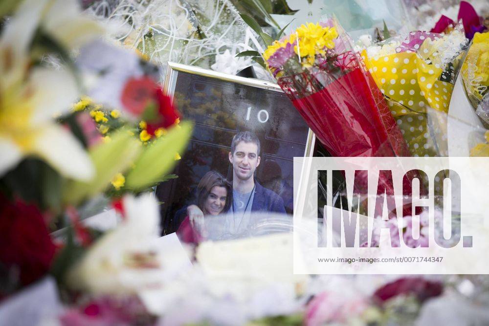 Birstall, Yorkshire, UK - Birstall UK. Picture shows the sea of flowers this morning in the market square in Birstall where MP Jo Cox was murdered last week. The man accused of her murder is due to appear at the Old Bailey in London today. Birstall UK - ZUMAl94_