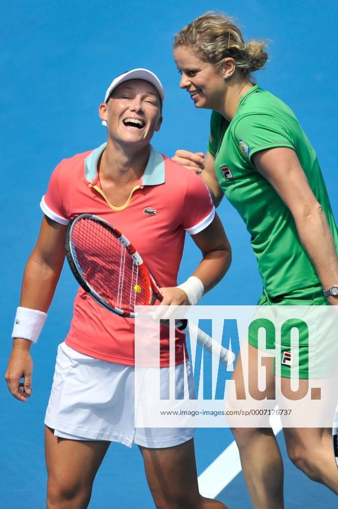 Jan. 16, 2011 - Melbourne, Victoria, Australia - Samantha Stosur l. Australia and Kim Clijsters BEL enjoying the tennis at the Rally For Relief charity exhibition match by top players of the 2011 Australian Open at Melbourne Park. - ZUMAx35