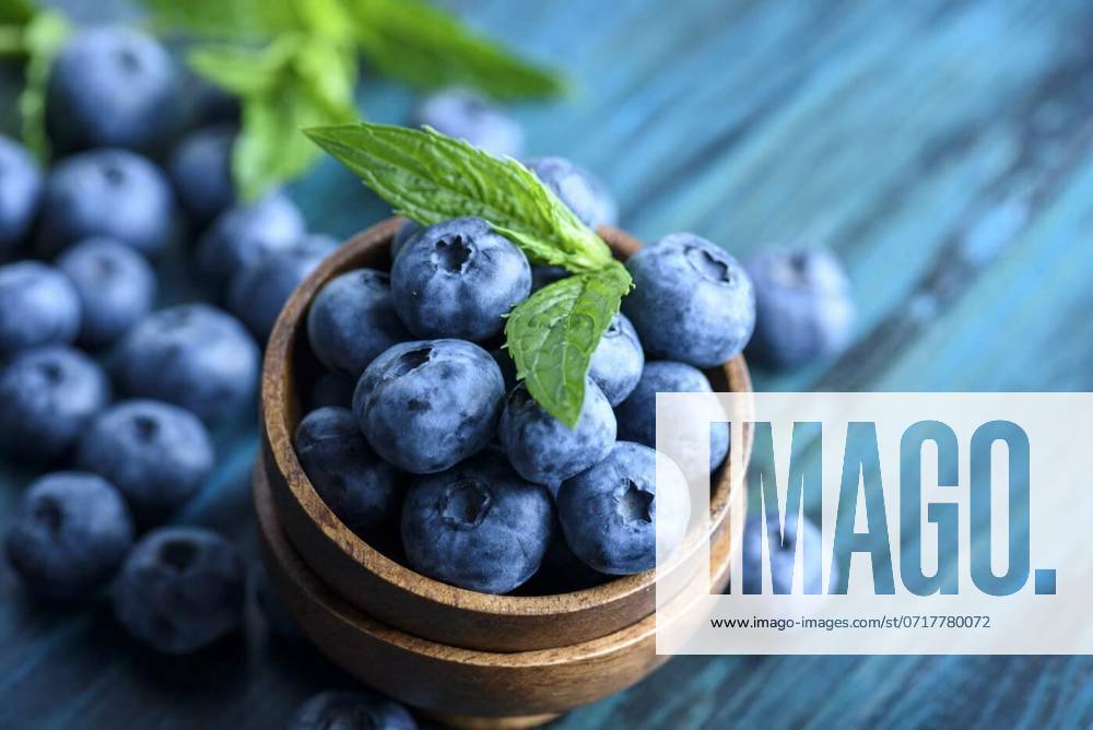 Bowl of fresh blueberries on blue rustic wooden table closeup., Bowl of fresh blueberries on blue rustic wooden table closeup. Colorful healthy organic seasonal fruit background. Organic food blueberries and mint leaf for healthy eating lifestyle., Bowl of fresh blueberries on blue rustic wooden table closeup. Colorful healthy organic seasonal fruit background. Organic food blueberries and mint leaf for healthy eating lifestyle., 28.08.2023,