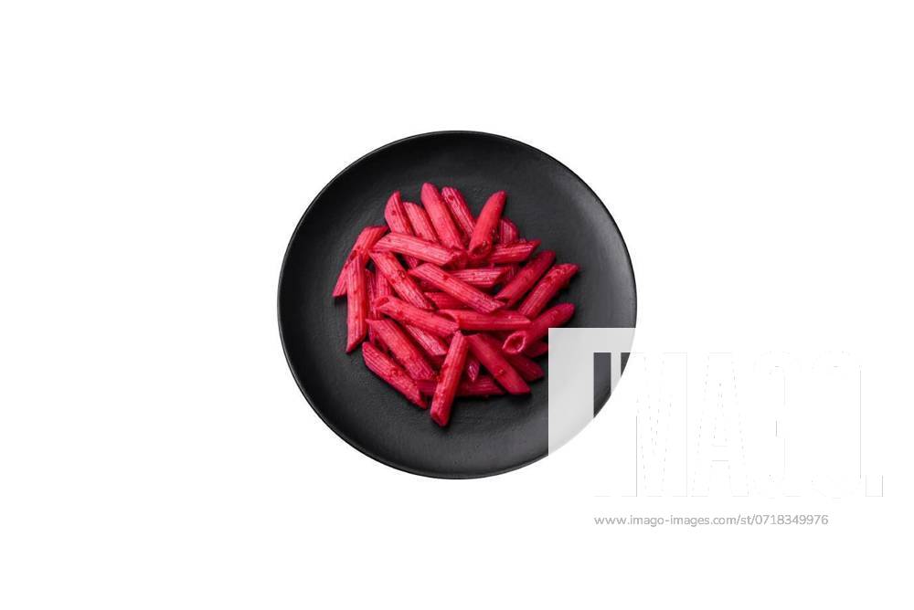Delicious penne pasta with beets, cheese, salt and spices, Delicious penne pasta with beets, cheese, salt and spices on a dark concrete background, Delicious penne pasta with beets, cheese, salt and spices on a dark concrete background, 07.09.2023,