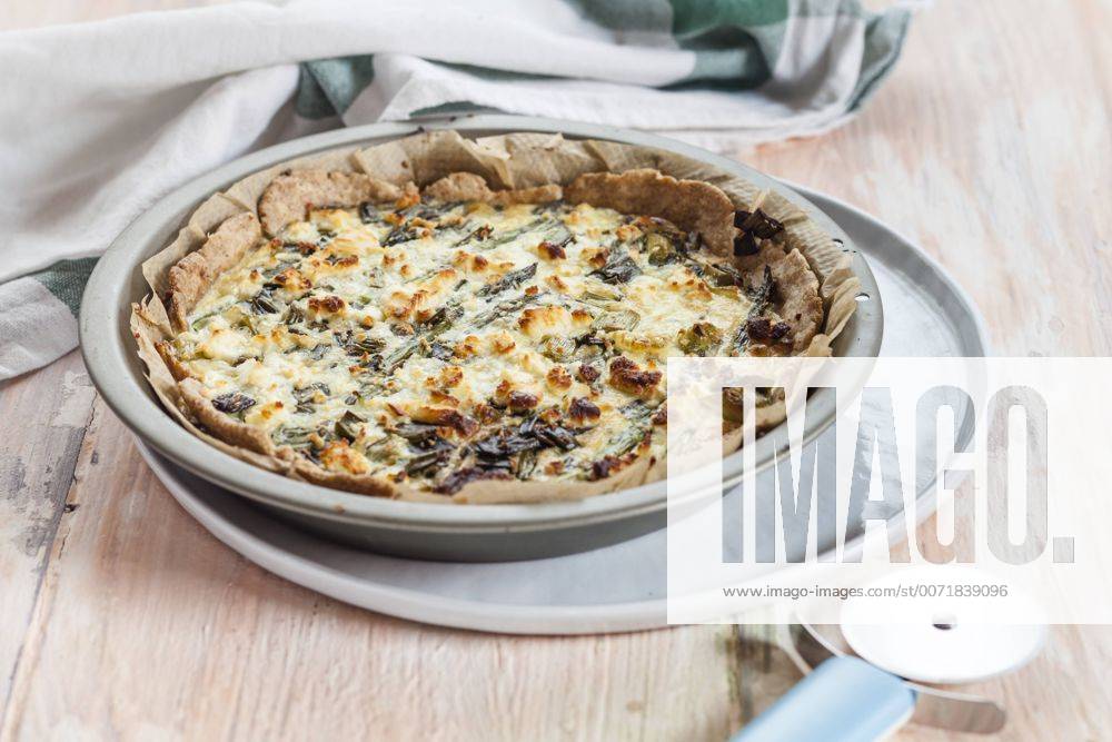 Baking dish of green asparagus tart with feta cheese SBDF002942