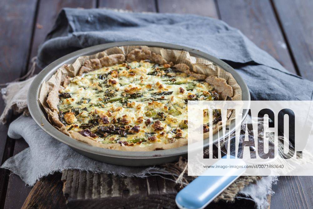 Baking dish of green asparagus tart with feta cheese SBDF002941