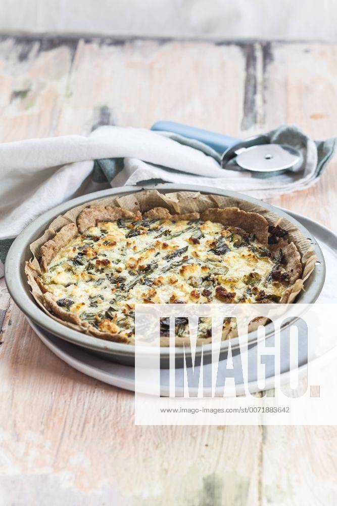 Baking dish of green asparagus tart with feta cheese SBDF002943