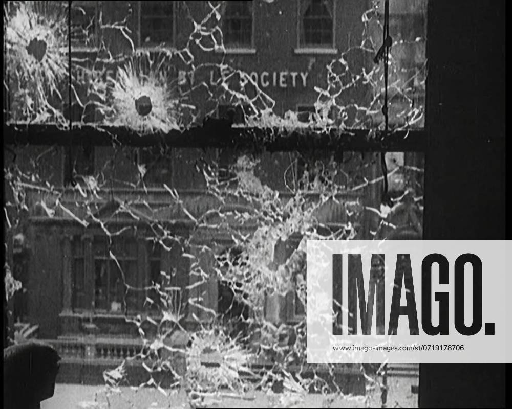 View Out of a Broken Window Resulting from Fighting in Dublin, 1922. From Time to Remember - Sitting Still And Going Slowly, 1922 (Reel 4); a review of events in 1922 including Irish Troubles, war between Greece and Turkey and developments in aviation and radio.