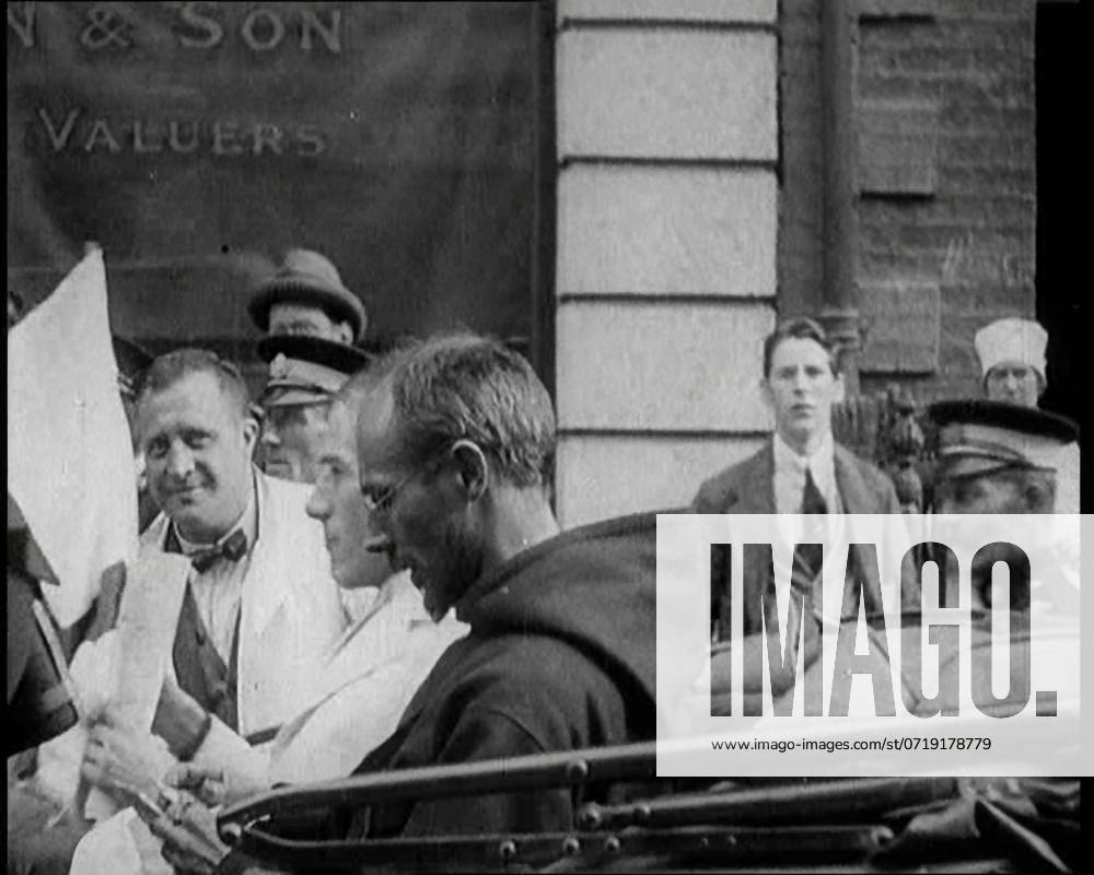 An Irish Priest Talking to a Soldier in a Car, Trying to Bring Peace, 1922. From Time to Remember - Sitting Still And Going Slowly, 1922 (Reel 4); a review of events in 1922 including Irish Troubles, war between Greece and Turkey and developments in aviation and radio.