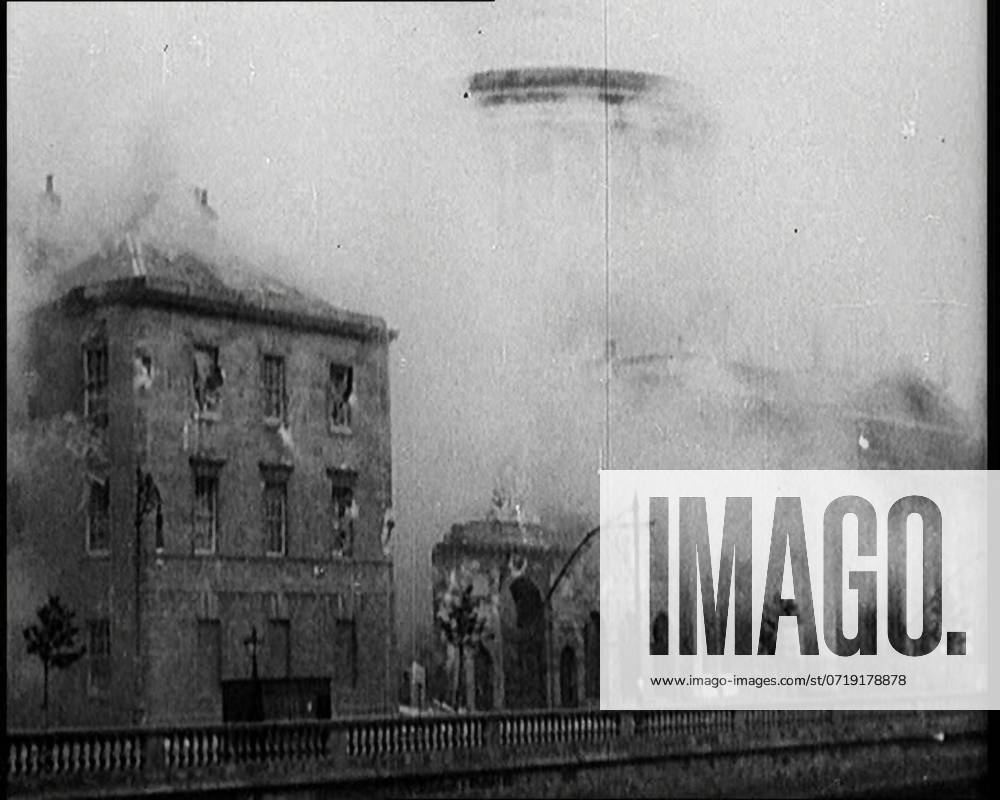 Smoking and Burnt Out Buildings in Dublin, 1922. From Time to Remember - Sitting Still And Going Slowly, 1922 (Reel 4); a review of events in 1922 including Irish Troubles, war between Greece and Turkey and developments in aviation and radio.
