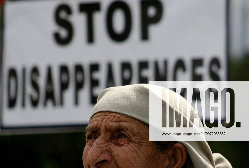 Mar 09, 2010 - Srinagar, Kashmir, India - Relative of missing Kashmiri muslim youths during a demonstration by the Association of Parents of Disappeared Persons (APDP) in Srinagar, the summer capital of Indian Kashmir. On the tenth of every month, members of APDP assemble in a park in Srinagar to highlight the issue of missing persons in Kashmir and remember their loved ones. The APDP says that more than 8,000 people have gone missing, most of them after their arrest by Indian security forces in the troubled Kashmir region since a rebellion broke out at the end of 1989. But authorities deny the allegations and say their investigations have revealed that most of the missing people have crossed the heavily militarised Line of Control which separates India and Pakistan into Pakistani Kashmir for arms training. - ZUMAz35_