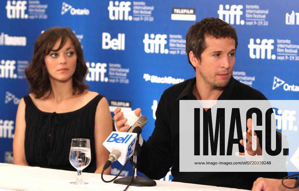 Marion Cotillard and Guillaume Canet at the press conference for Little White Lies during the Toronto International Film Festival at Roy Thompson Hall in Canada - 12 September 2010 FAM39411
