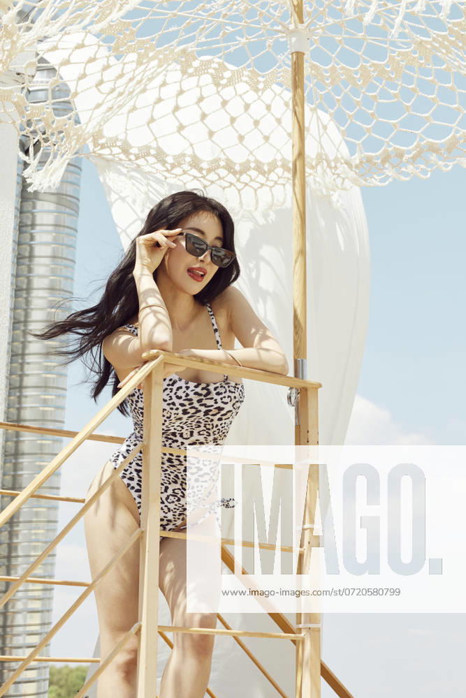 25-29 Years,Season,Day,Heat,Asian Ethnicity,Lifestyle,Rooftop,Sunny,Beautiful Woman,Wind,People,Refreshment,Sunglasses,Sexy,Swimming Suit,Outdoors,Beauty,Summer,Relaxing,Relaxed,Female,One Woman Only,Full Length,Young Female,Young Adult,Concept,Sky,Korean Ethnicity,One Person,Sunlight,Leopard Print,Vacation, , 02.06.2022, model released, tip1140008660 tip1140008660