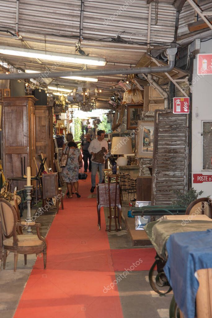 Paris, France. August 2022. One of the many antique shops at the Saint Quen flea market in Paris. High quality photo