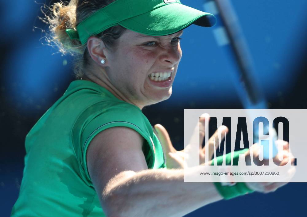 Kim Clijsters of Belgium returns the ball during the third round match of women s singles at the Australian Open tennis tournament in Melbourne Jan. 22, 2011. Kim Clijsters won 2-0.