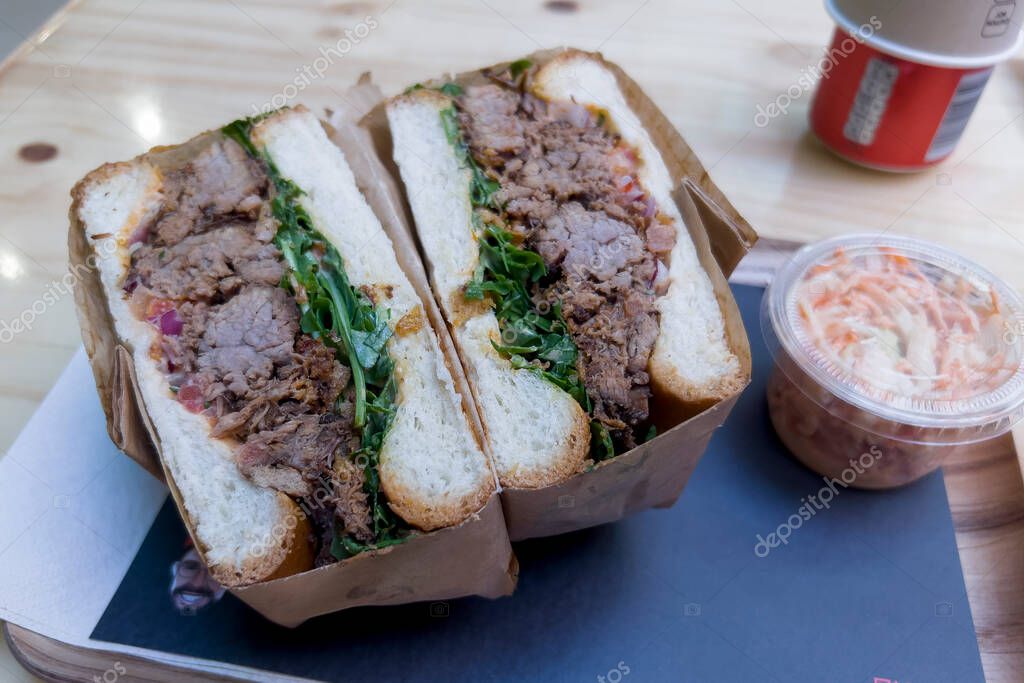 A sandwich with roasted beef served in restaurant in in central Paris, France on May 2, 2023.