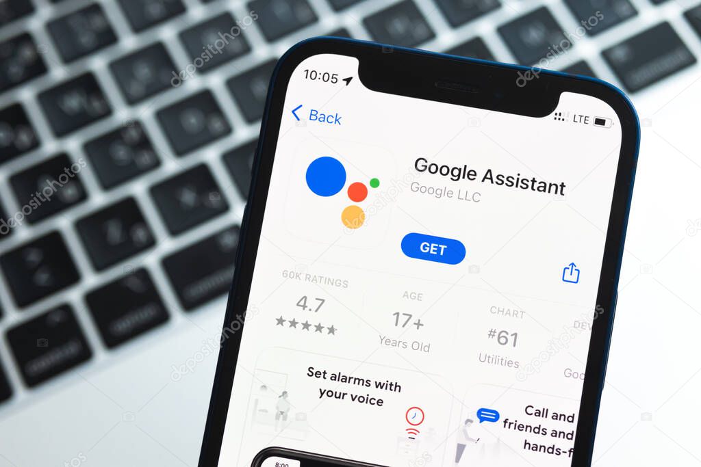 Google assistant app on the iPhone screen, application icon close-up