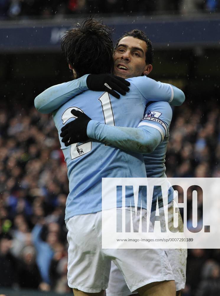 Carlos Tevez of Manchester City (R) celebrates his first goal with David Silva of Manchester City --- Manchester City vs. West Bromwich Albion . o0 Freude